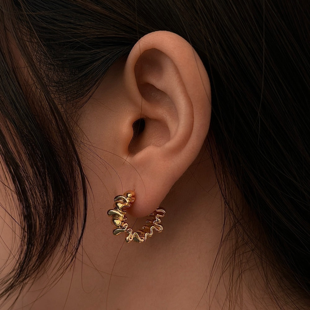 Stylish studs in modern ribbed design Stornfield
