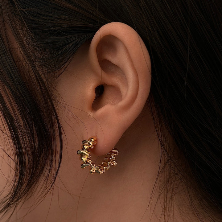 Stylish studs in modern ribbed design Stornfield