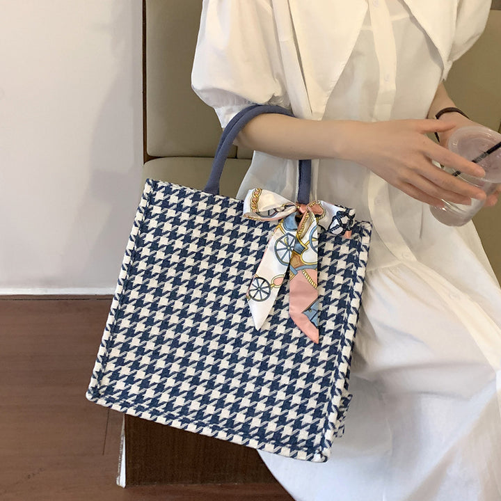Elegant Houndstooth Handbag with Decorative Bow
