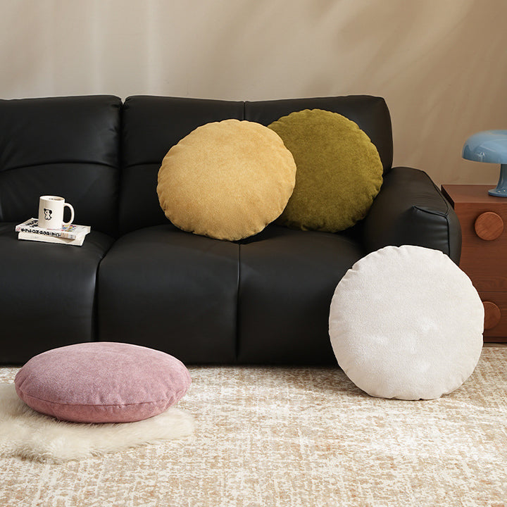 Round floor seat pouf made of teddy plush with a shape-retaining padded core Stornfield