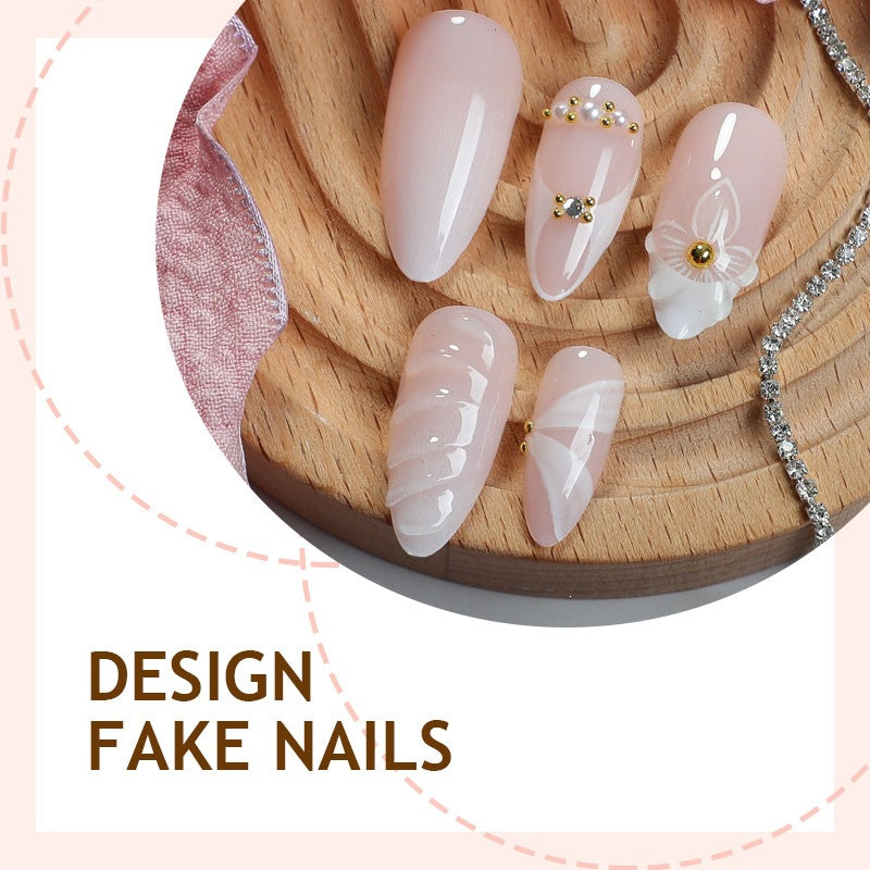 Artificial nail set with elegant floral design and luxurious accents Stornfield