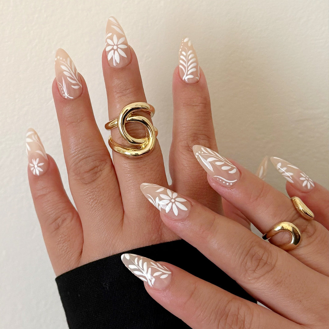 Stiletto nails with floral decorations Stornfield