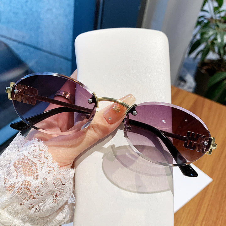 Ladies fashionable sunglasses in elegant oval design Stornfield