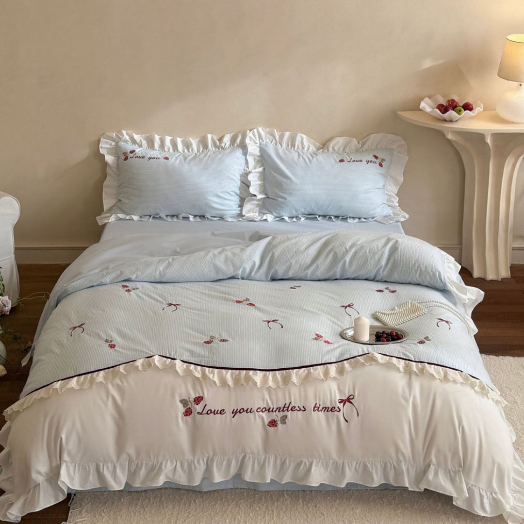 Bedding set made of breathable cotton blend with ruffle and flower bow embroidery