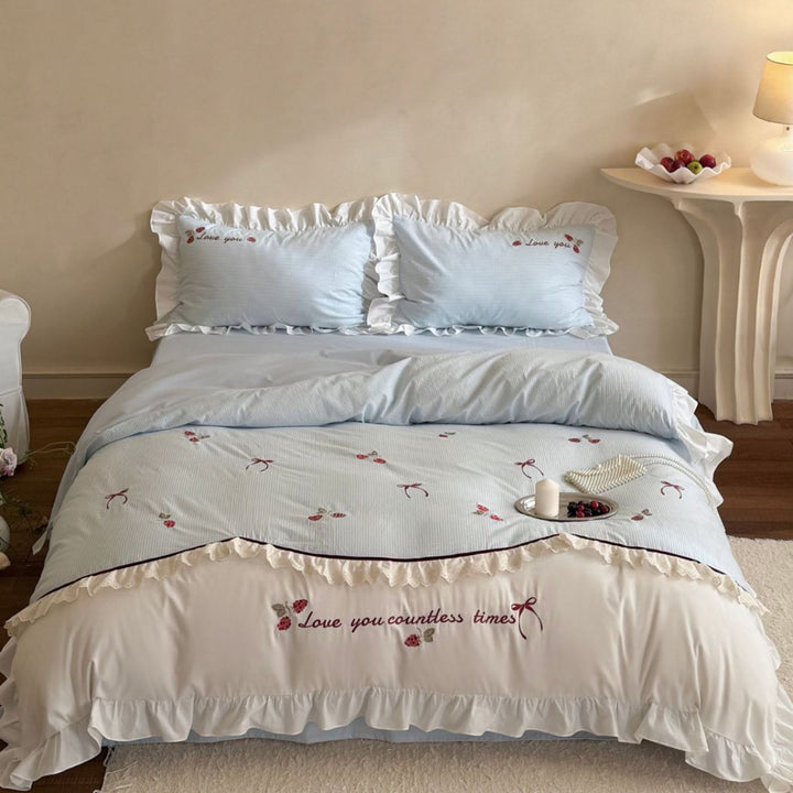 Bedding set made of breathable cotton blend with ruffle and flower bow embroidery