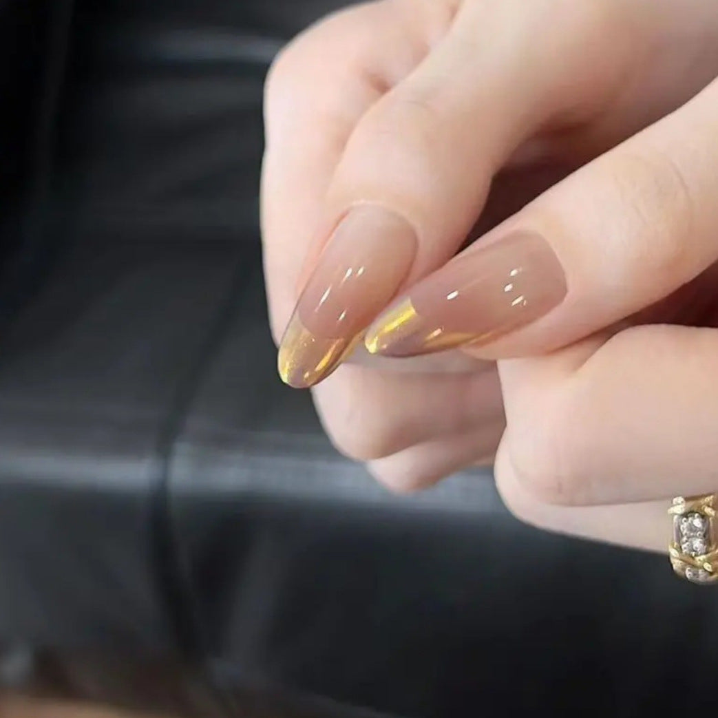 Nail art with elegant gradient and metallic accents Stornfield