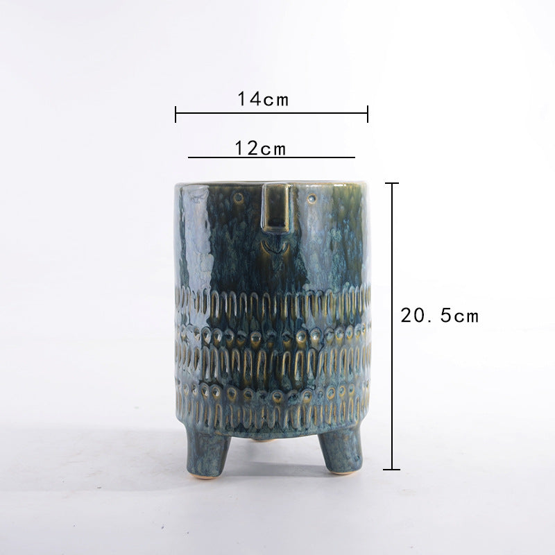 Decorative plant pot with facial features Stornfield