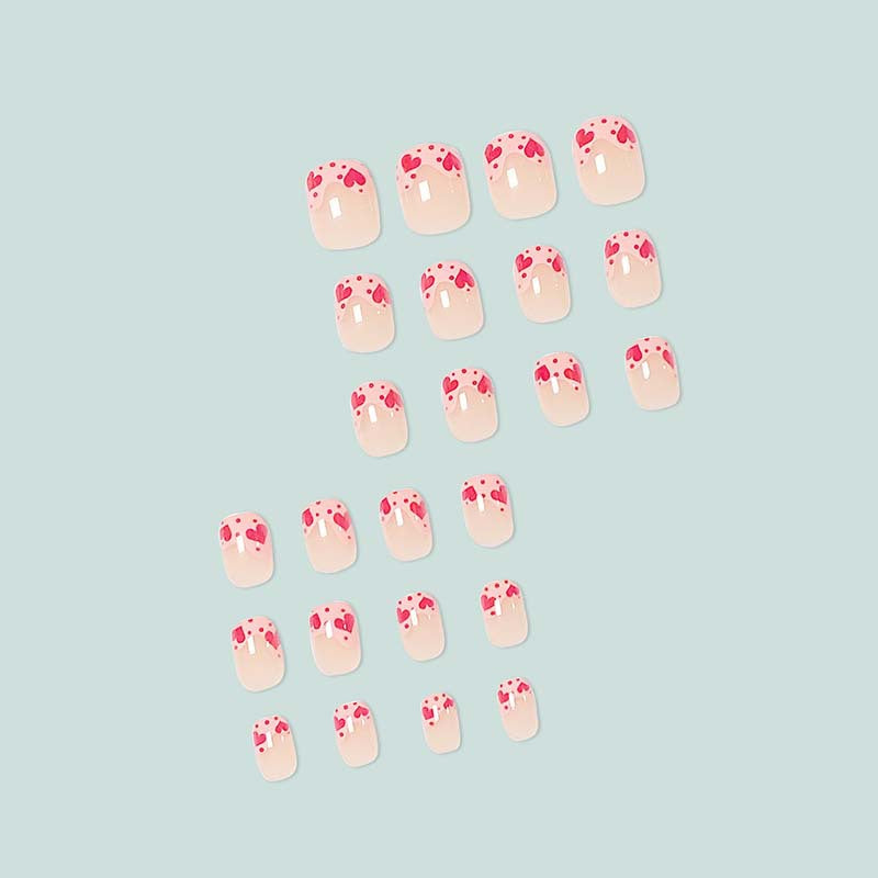 Artfully designed nail tips with heart motifs Stornfield