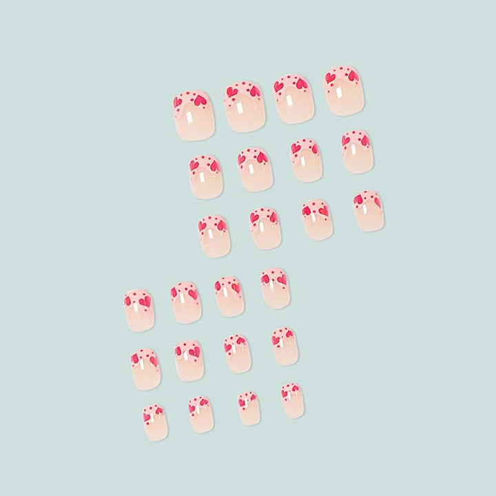 Artfully designed nail tips with heart motifs Stornfield