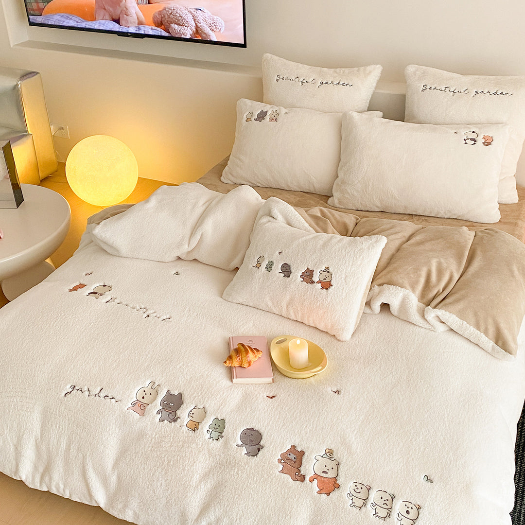 Fluffy bedding set with embroidered cartoon animals and Sherpa surface