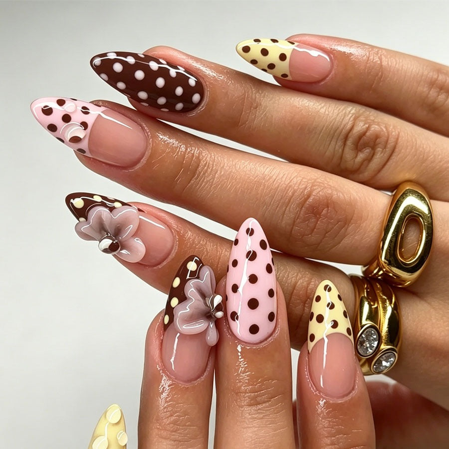 Creative nail art set with floral and polka dot design Stornfield