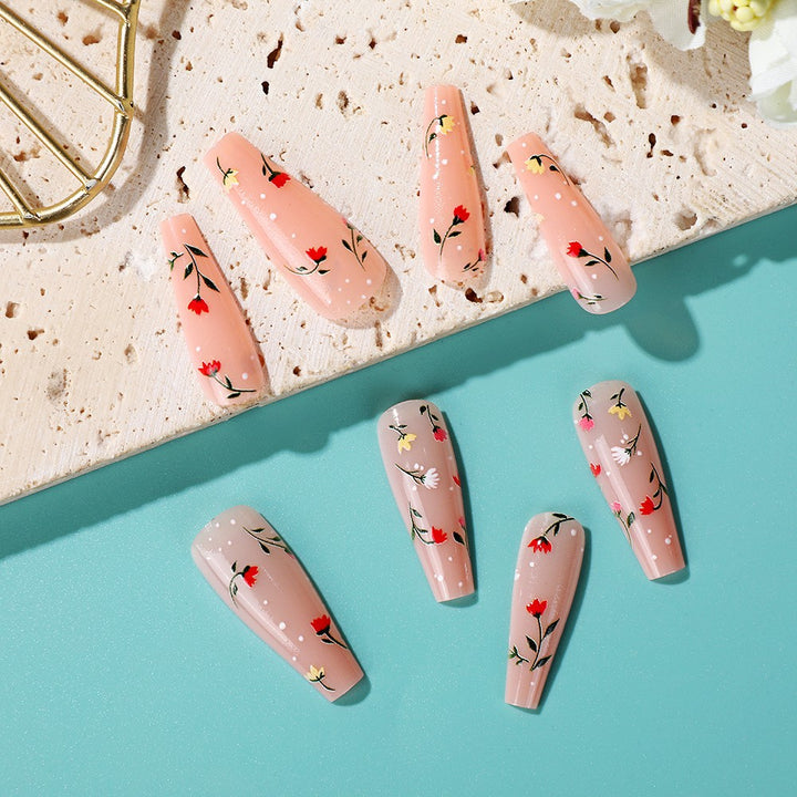Elegant artificial nails with floral decorations Stornfield
