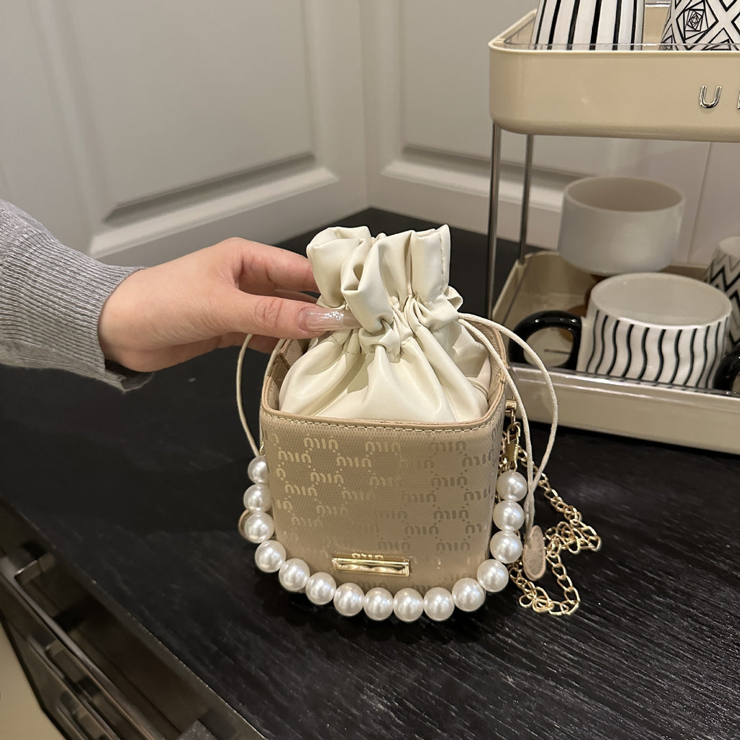 Elegant Pearl-Handled Mini Bucket Bag Stornfield