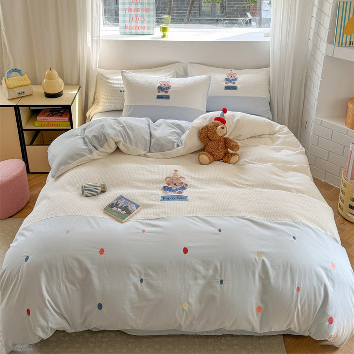 Quilted cotton bedding with cherry embroidery and reversible pillowcases