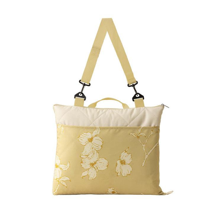 Reversible quilted shoulder bag with removable shoulder strap and floral canvas Stornfield
