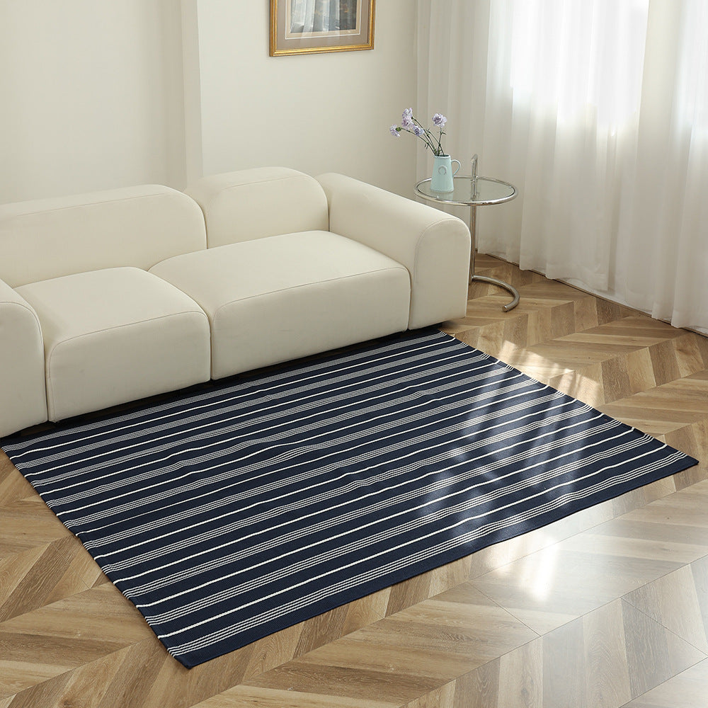 Flat-woven striped living room rug with low pile and non-slip backing