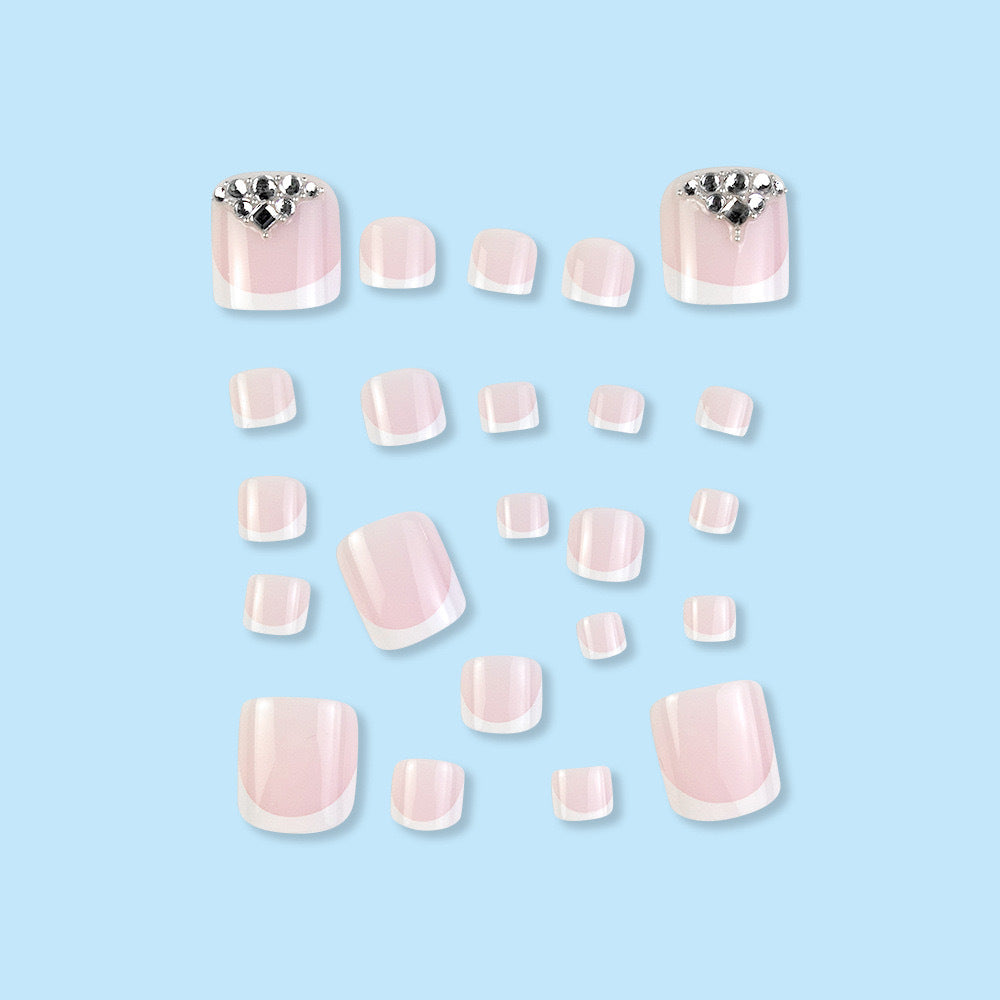 Nail art set with elegant French tips and sparkling rhinestone details Stornfield