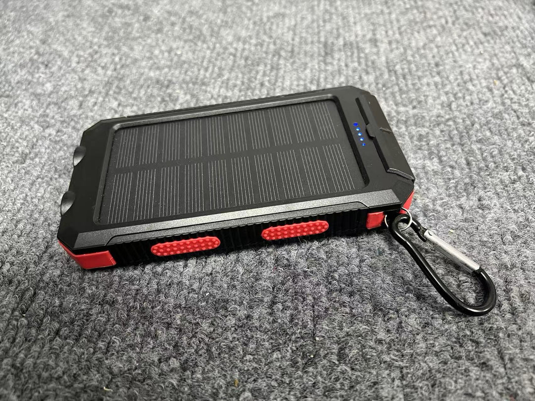 Portable solar power bank with integrated charging plug function Stornfield