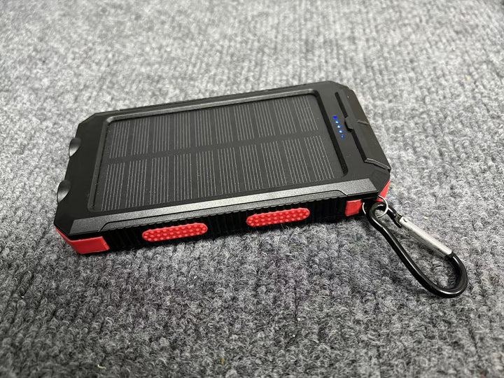Portable solar power bank with integrated charging plug function Stornfield