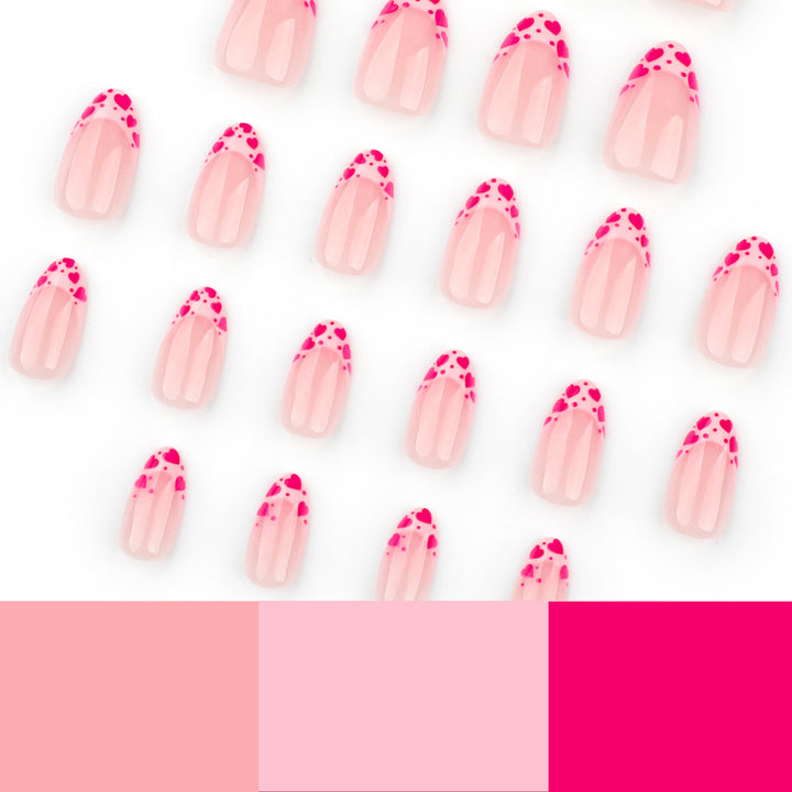 Artificial nail extensions with heart tip accents Stornfield