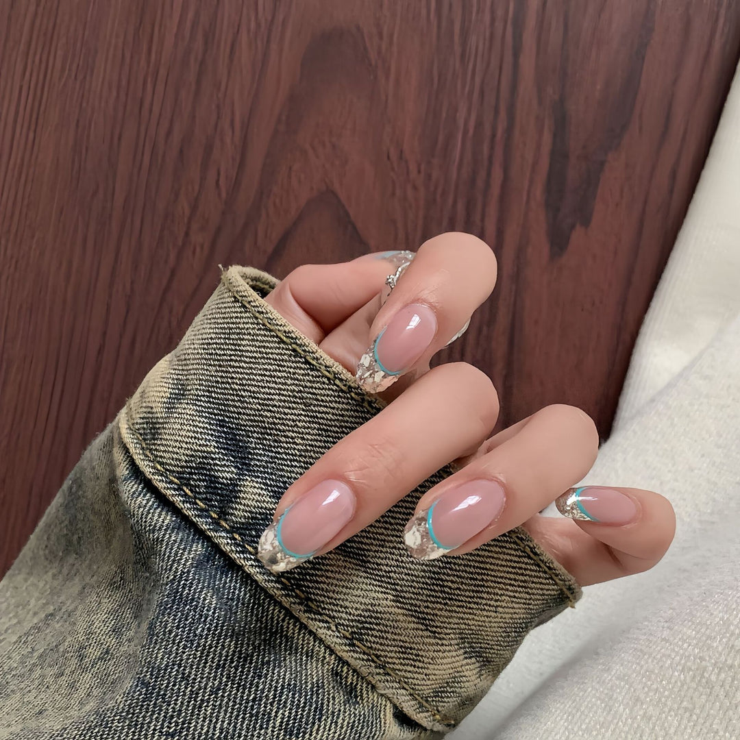 Artificial nails with shimmering glitter and elegant French-tip design Stornfield