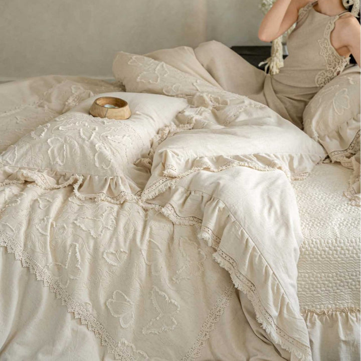 Linen bed linen set in Boho style with ruffles, relief embroidery and stonewashed finish