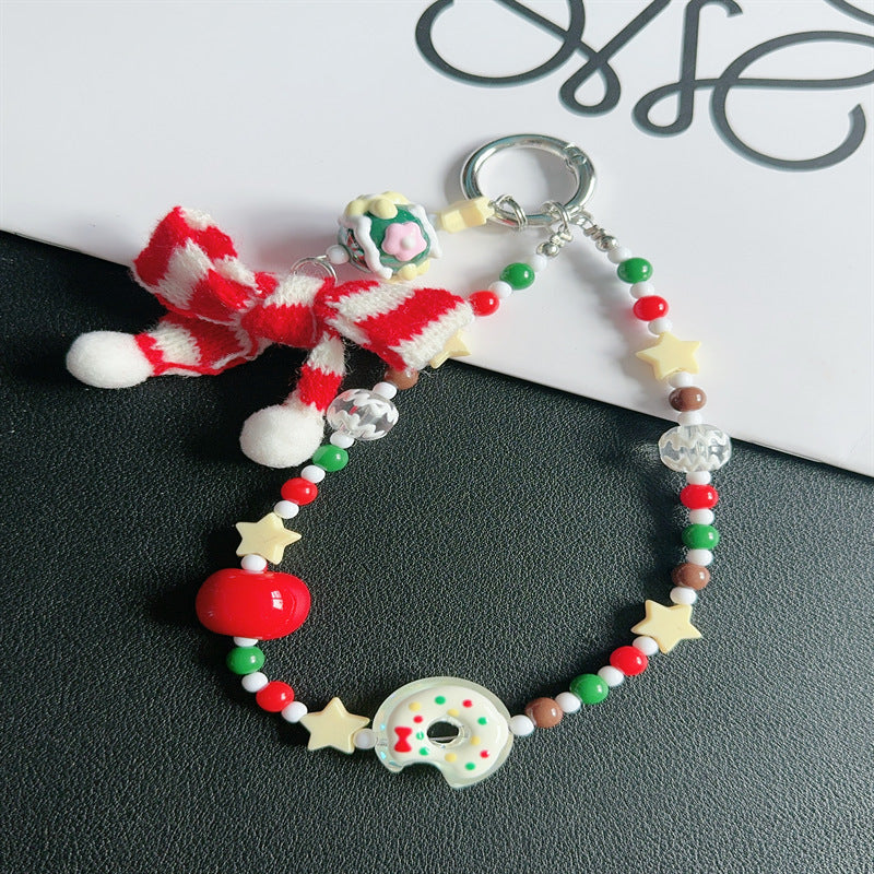 Playful Seasonal Charm Phone Strap Stornfield