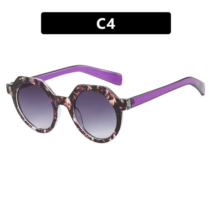 Ladies extravagant round sunglasses with colored accented frame Stornfield