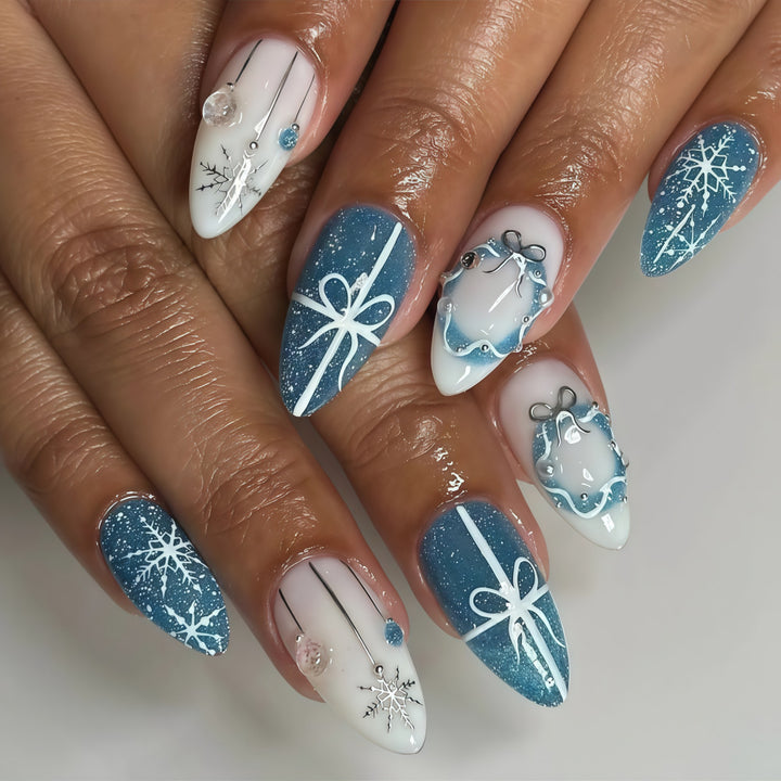 Artificial nails in elegant winter design with glitter accents Stornfield