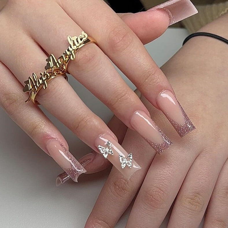 Artistic Long Glossy Almond-Shaped Nail Extensions Stornfield