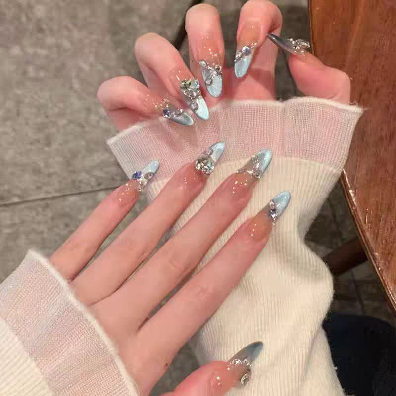 Artifical nails with shiny rhinestone decorations Stornfield