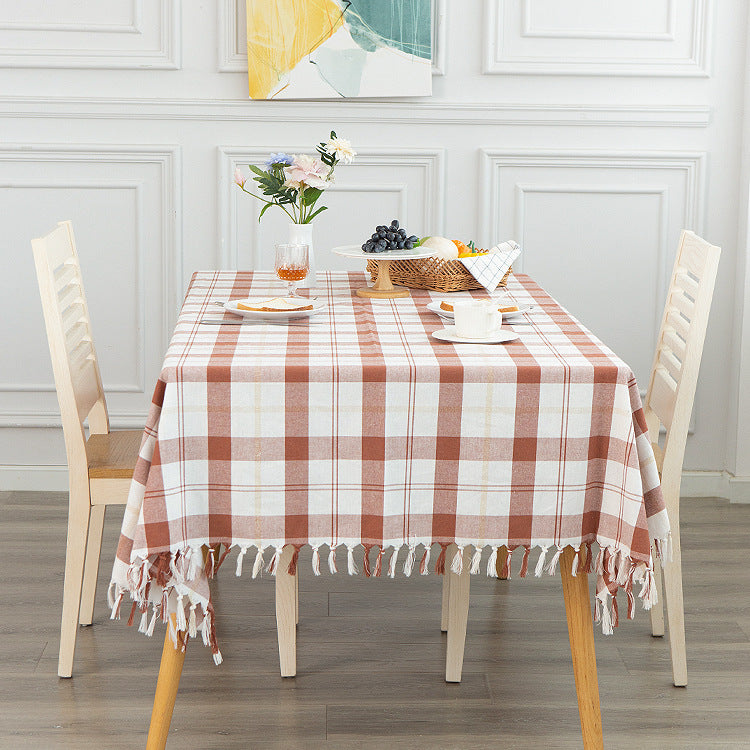 Rectangular checked cotton tablecloth with decorative fringes and light linen finish Stornfield