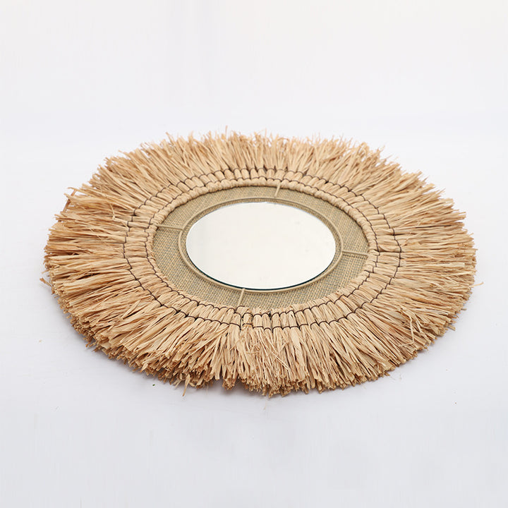 Decorative wall mirror with natural rattan frame Stornfield
