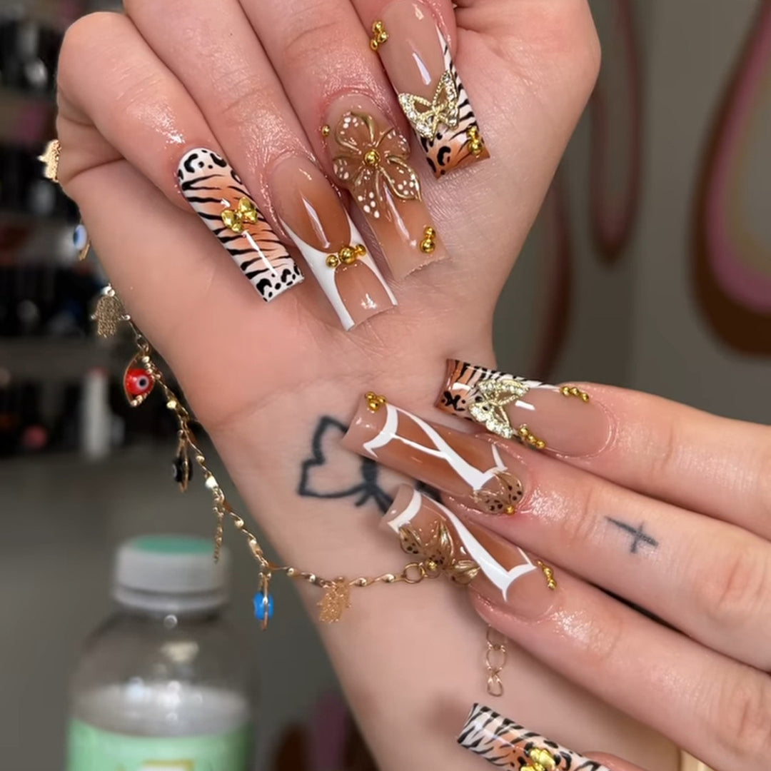 Artificial nails with unique animal and flower motifs Stornfield