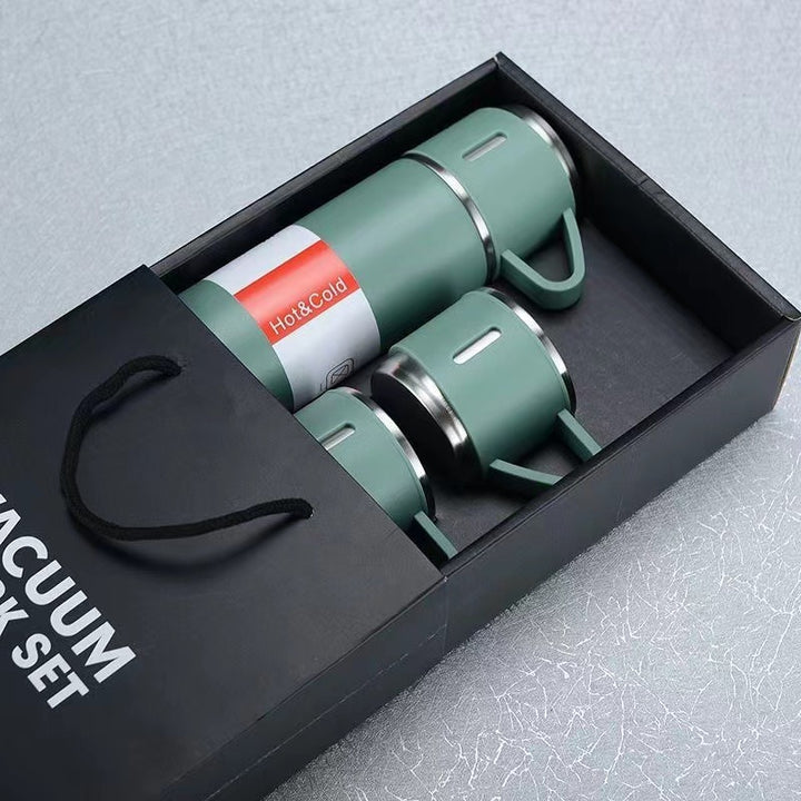Women’s stainless steel vacuum flask with two accompanying cups Stornfield