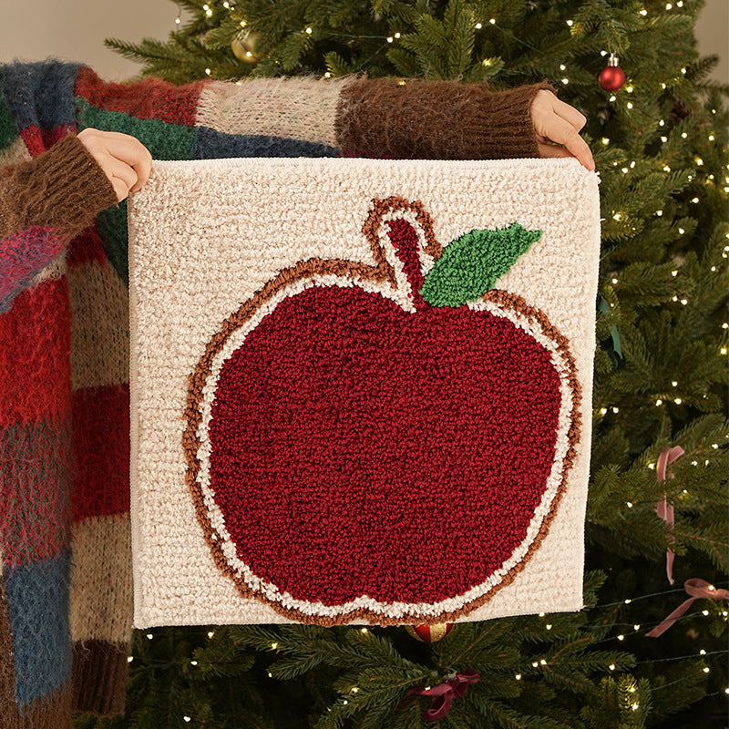 Tufted Christmas placemat with gingerbread house motif Stornfield