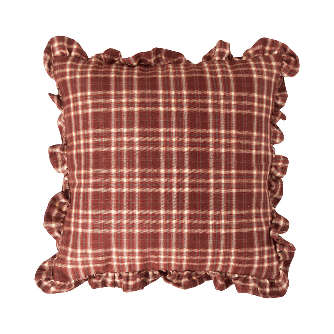 Decorative cushion with gingham pattern and playful ruffled edge