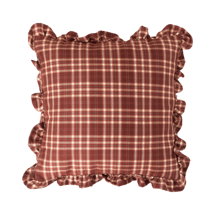 Decorative cushion with gingham pattern and playful ruffled edge