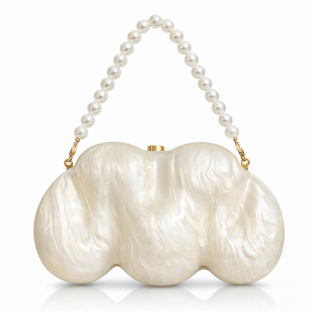 Pearl-Handled Artistic Clutch