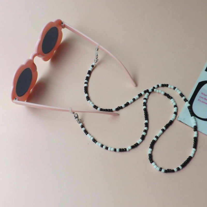 Sunglasses with fashionable pearl band Stornfield