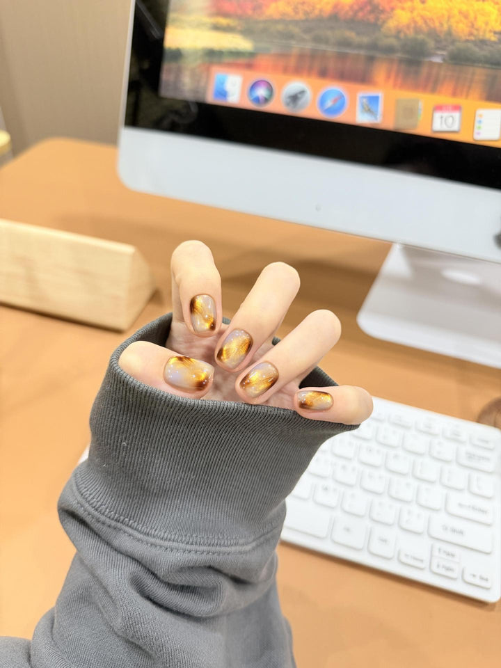 Artificial nails with noble metallic design Stornfield