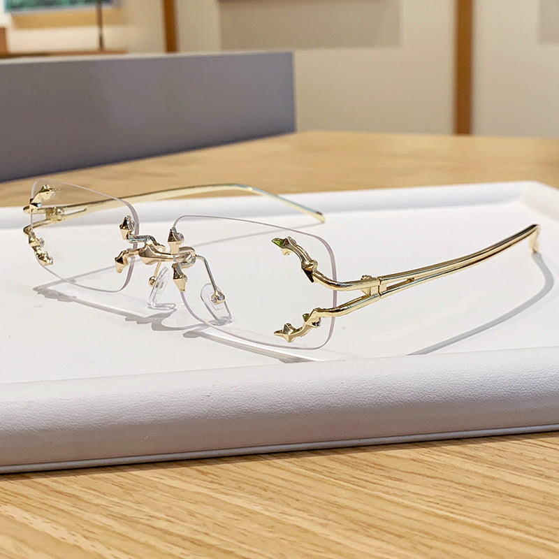 Women's fashionable sunglasses with delicate metal frame and transparent lenses Stornfield