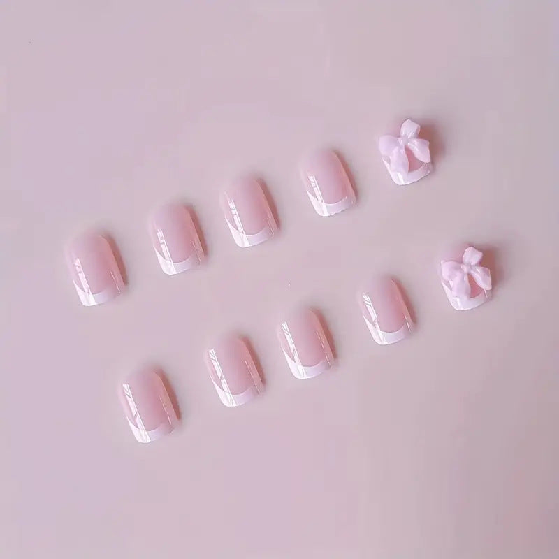 Elegant French Tip Press-On Nails with Bow Detail Stornfield