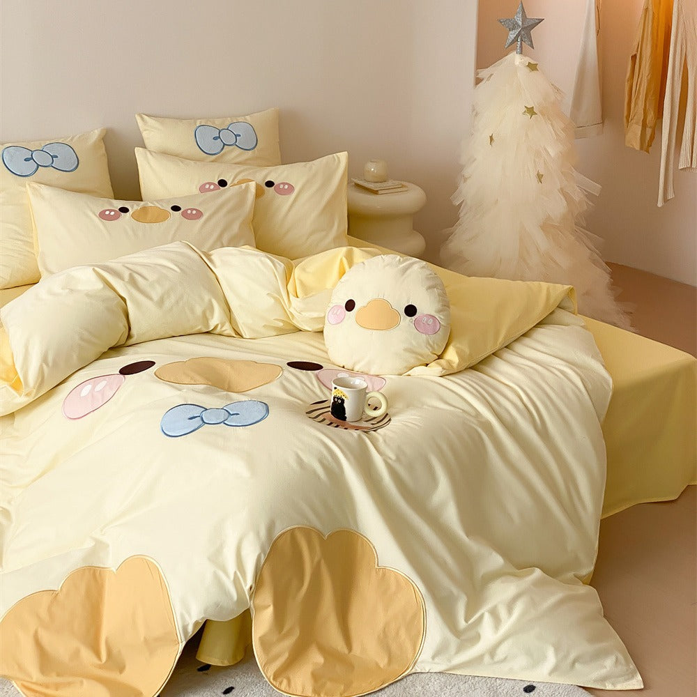 Children's bedding set with embroidered duck motif, reversible cover and cuddle pillow