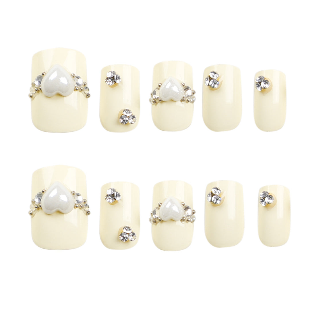 Artistic Nail Extensions with Elegant Decorative Details Stornfield