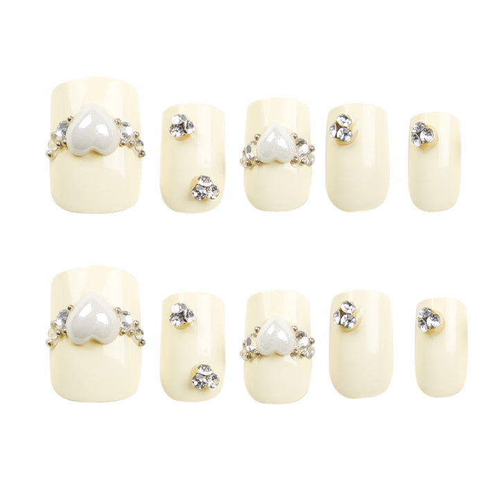 Artistic Nail Extensions with Elegant Decorative Details Stornfield