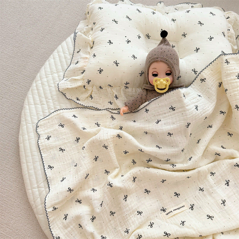 Unisex Muslin Blanket with delicate floral design and elegant ruffles Stornfield