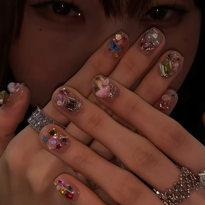 Artificial nails with sparkling crystal accents Stornfield