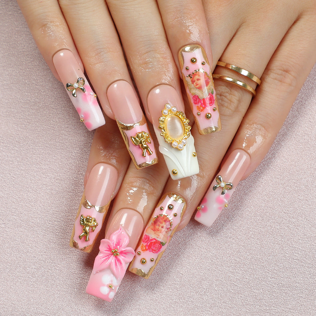 Creative nail art set with blooming decorations and glitter accents Stornfield