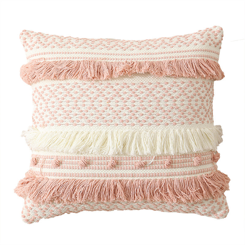 Textured Boho decorative pillow with fringes, tassels, and woven dot pattern